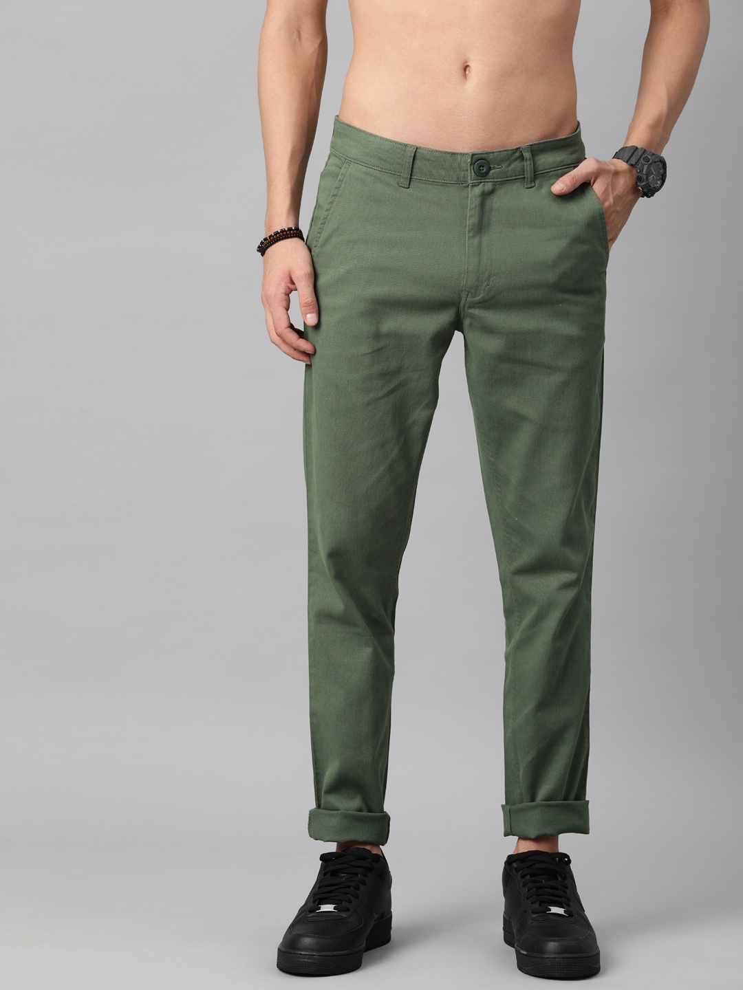 

Roadster Men Olive Green Solid Regular Trousers