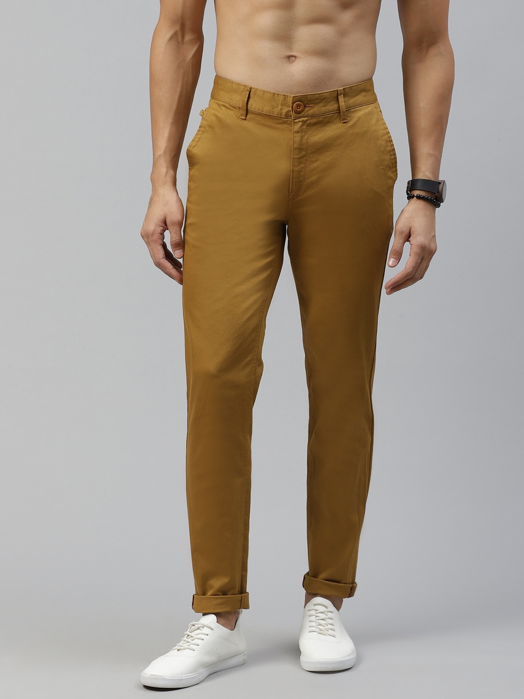 

Roadster Men Khaki Tapered Fit Solid Regular Trousers