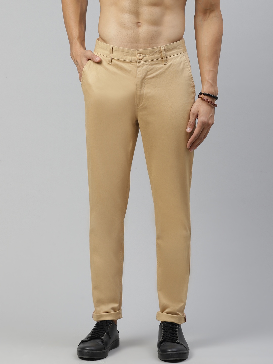 

Roadster Men Beige Tapered Fit Solid Regular Trousers