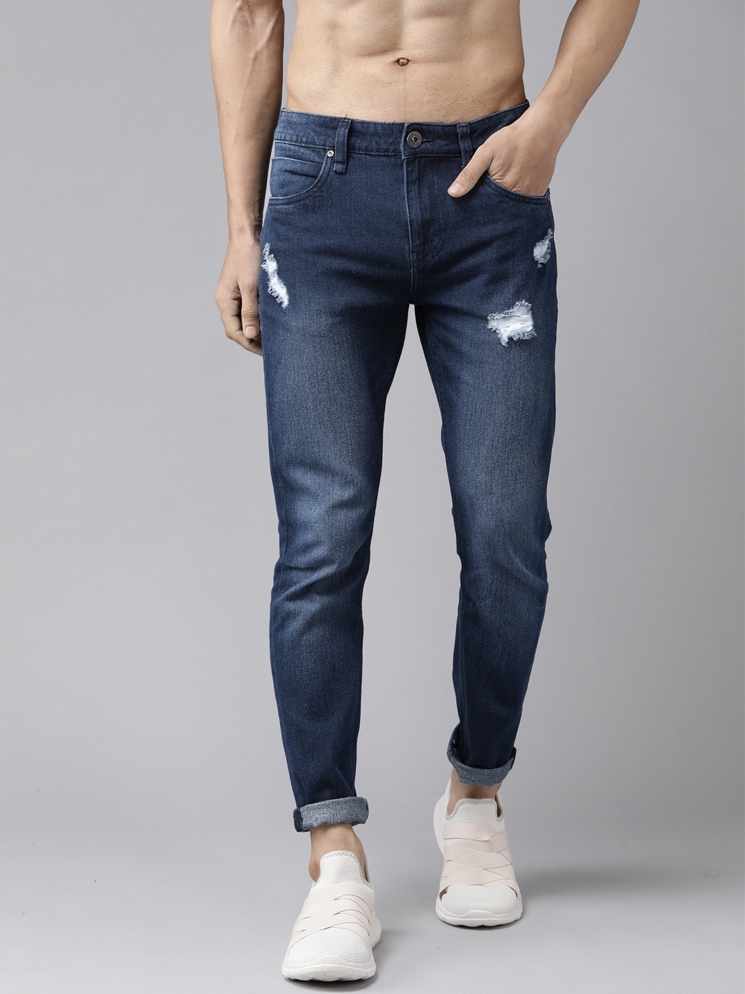 

Roadster Men Navy Blue Skinny Fit Mildly Distressed Light Fade Stretchable Jeans