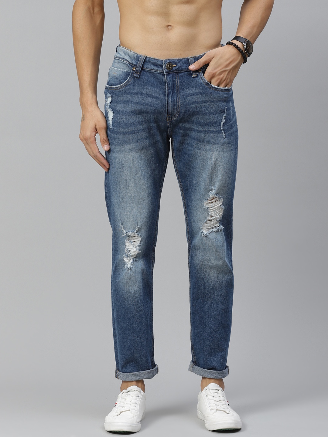 

Roadster Men Blue Slim Tapered Fit Low Distress Light Fade Stretchable Jeans