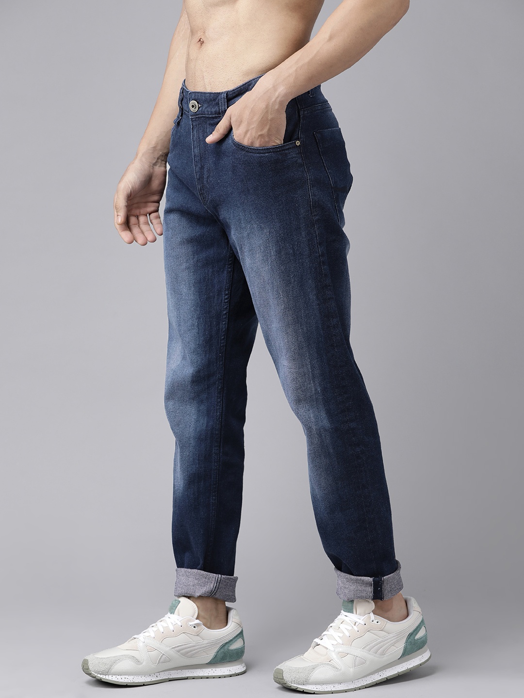 

Roadster Men Navy Blue Carrot Fit Light Fade Stretchable Jeans