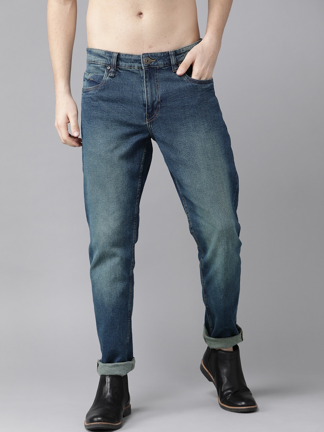 

Roadster Men Navy Blue Light Fade Carrot Fit Stretchable Jeans