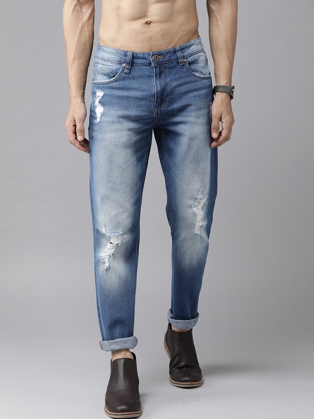 

Roadster Men Blue Slim Fit Mildly Distressed Light Fade Stretchable Jeans