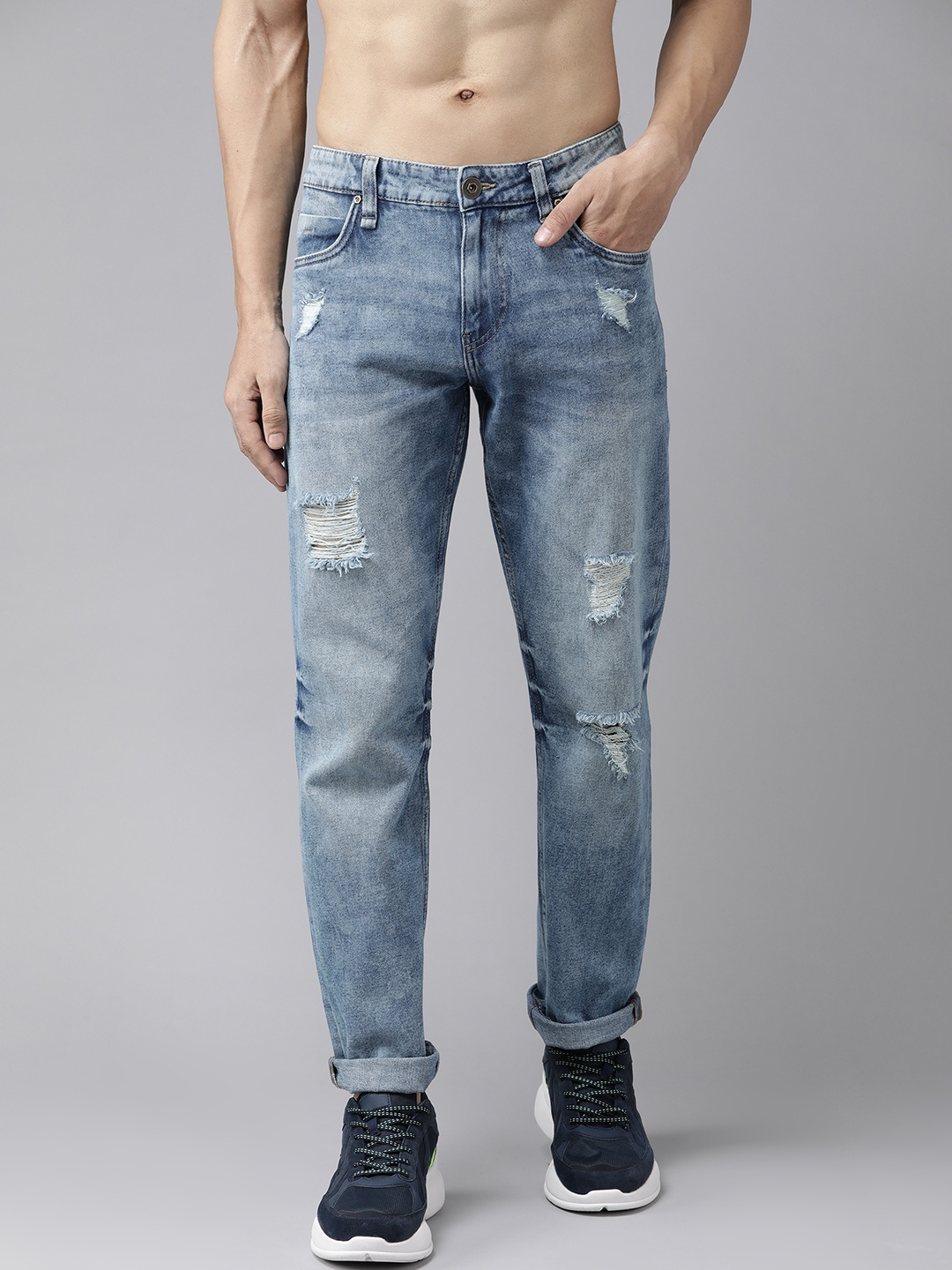 

Roadster Men Blue Slim Fit Mildly Distressed Heavy Fade Stretchable Jeans