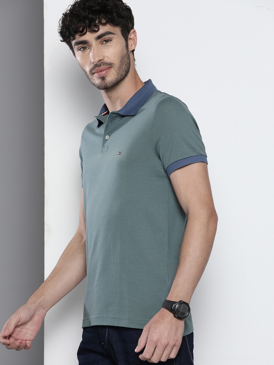 

Tommy Hilfiger Men Green Slim Fit Self Design Polo Collar Pure Cotton T-shirt