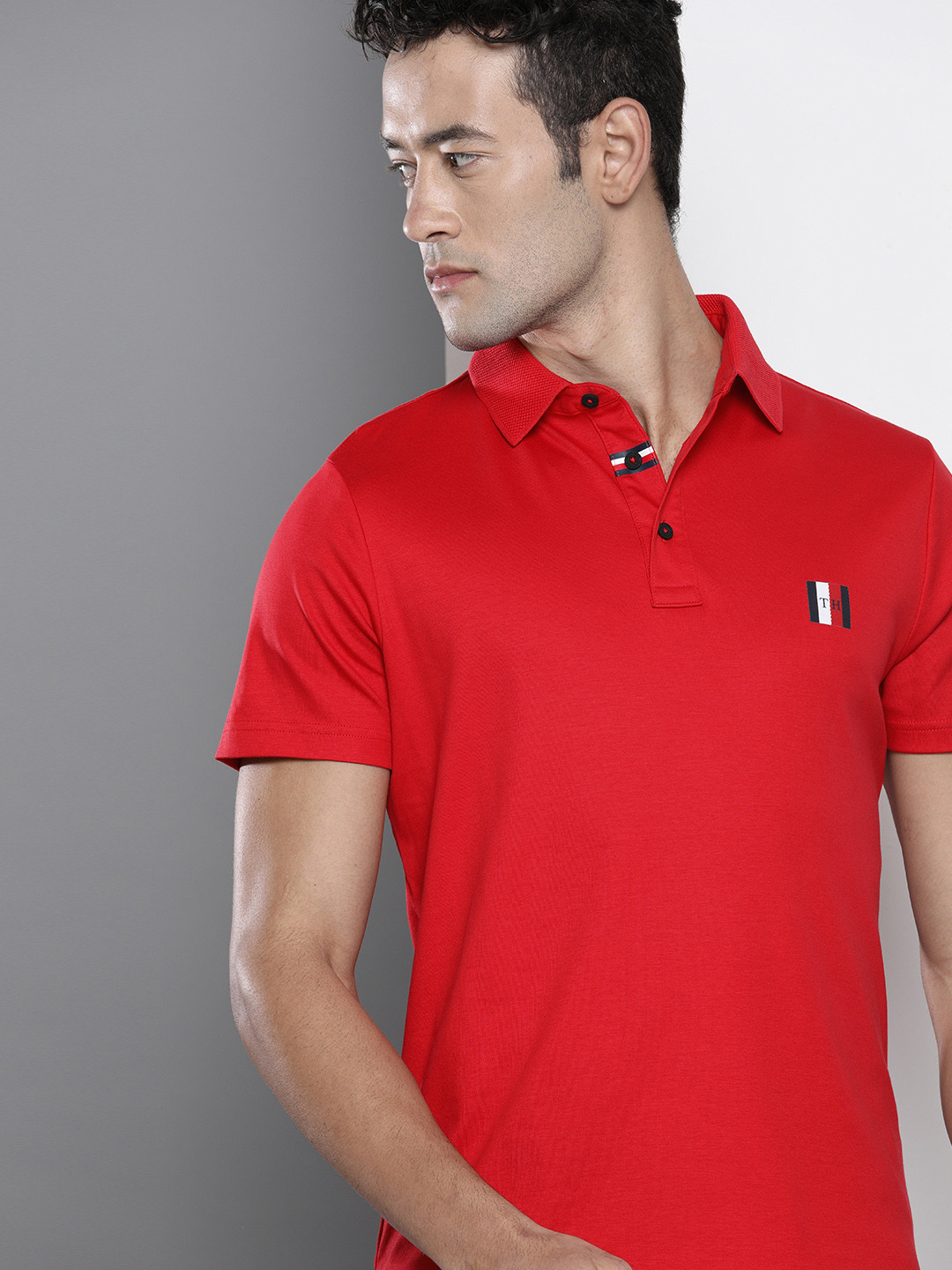

Tommy Hilfiger Men Red Slim Fit Solid Polo Collar Pure Cotton T-shirt