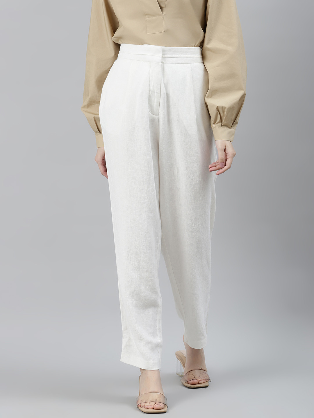 

Marks & Spencer Women White Tapered Fit Solid Trousers