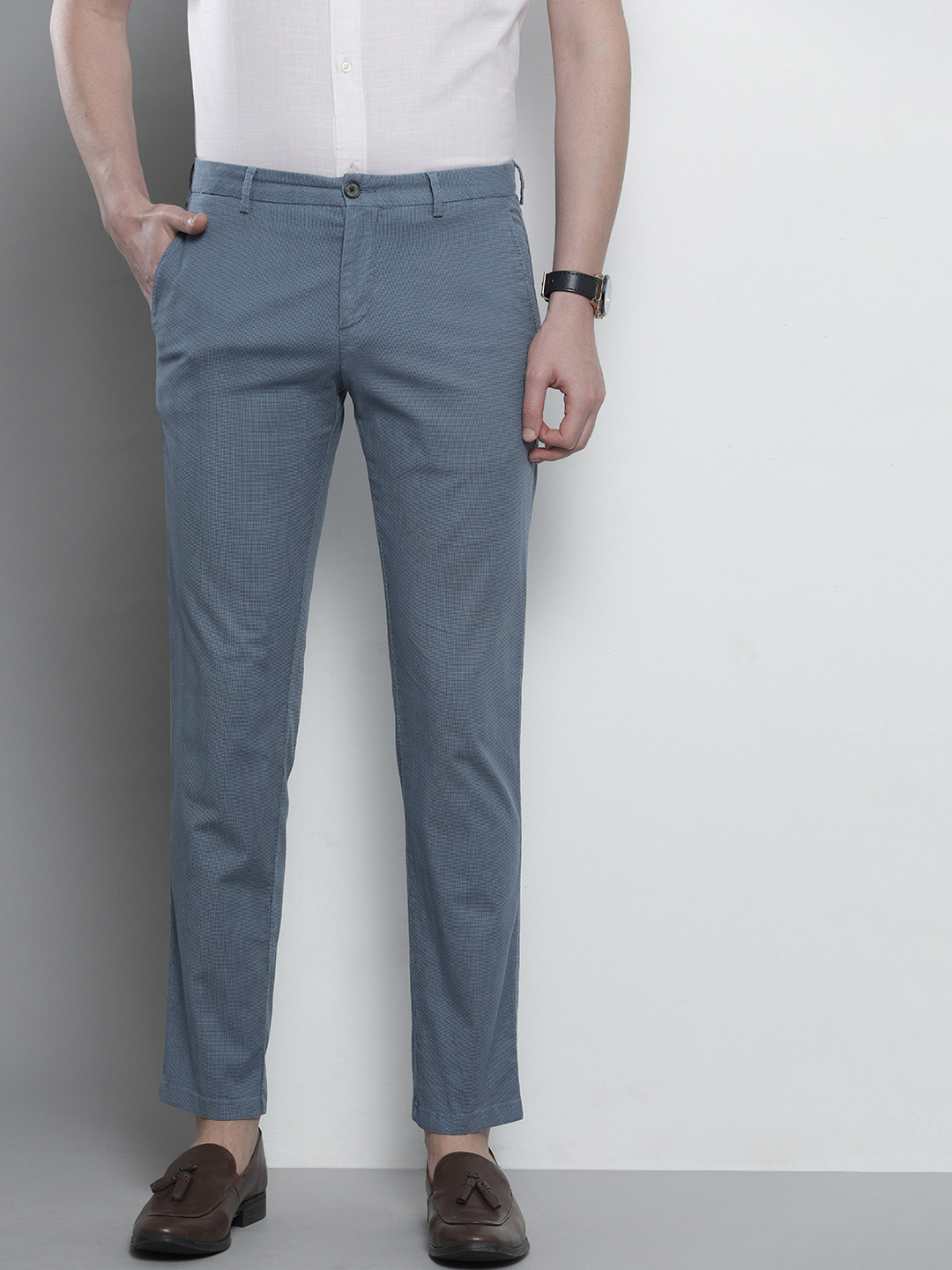 

Tommy Hilfiger Men Navy Blue Slim Fit Solid Regular Trousers