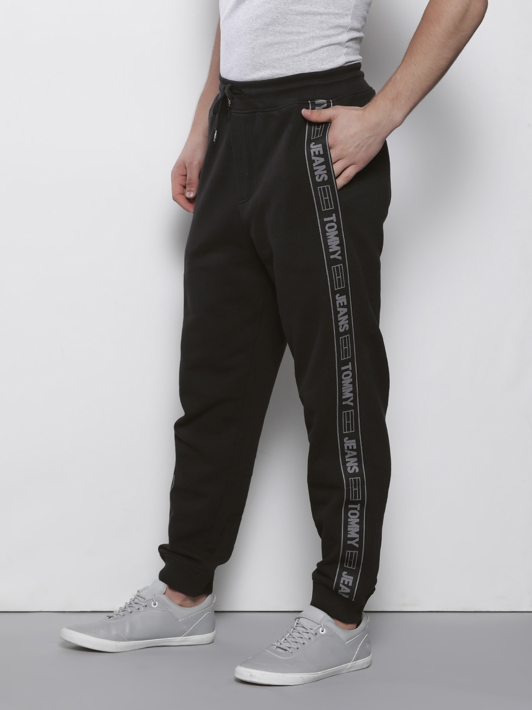 

Tommy Hilfiger Men Black Solid Pure Cotton Joggers with Side Taping Detail