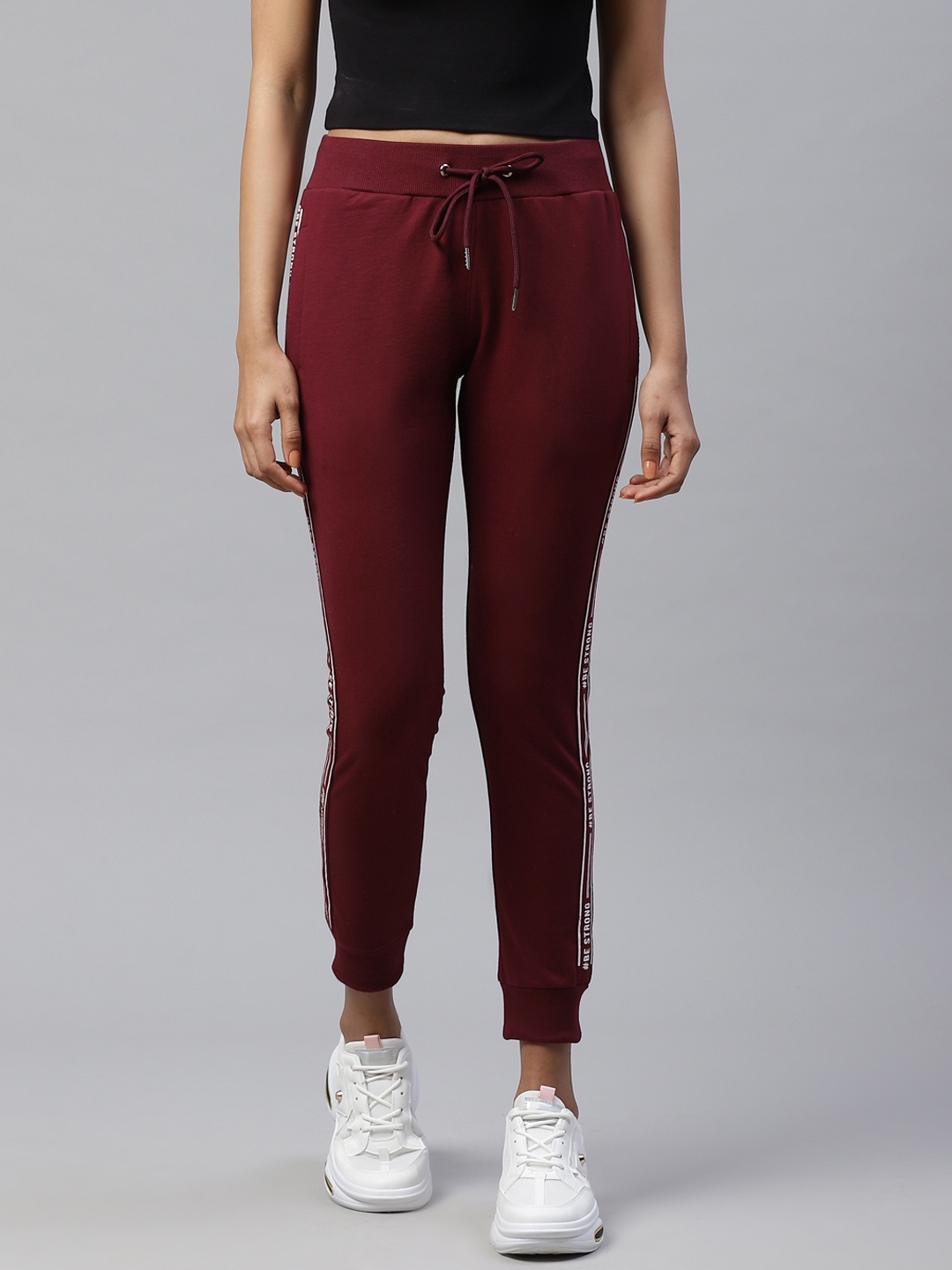 

M7 by Metronaut Women Maroon Slim Fit Solid Joggers with Side Print Detail