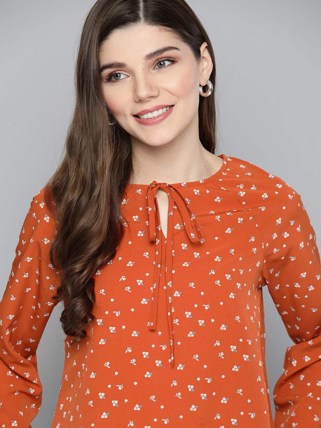 

M&H Our Water Sustainable Rust Orange & Off White Floral Printed Tie-Up Neck Regular Top