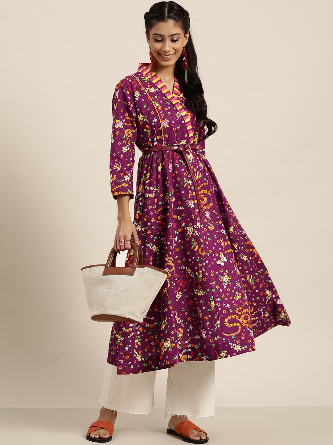 

Sangria Women Purple & Orange Ethnic Motifs Print Cotton Panelled A-line Kurta