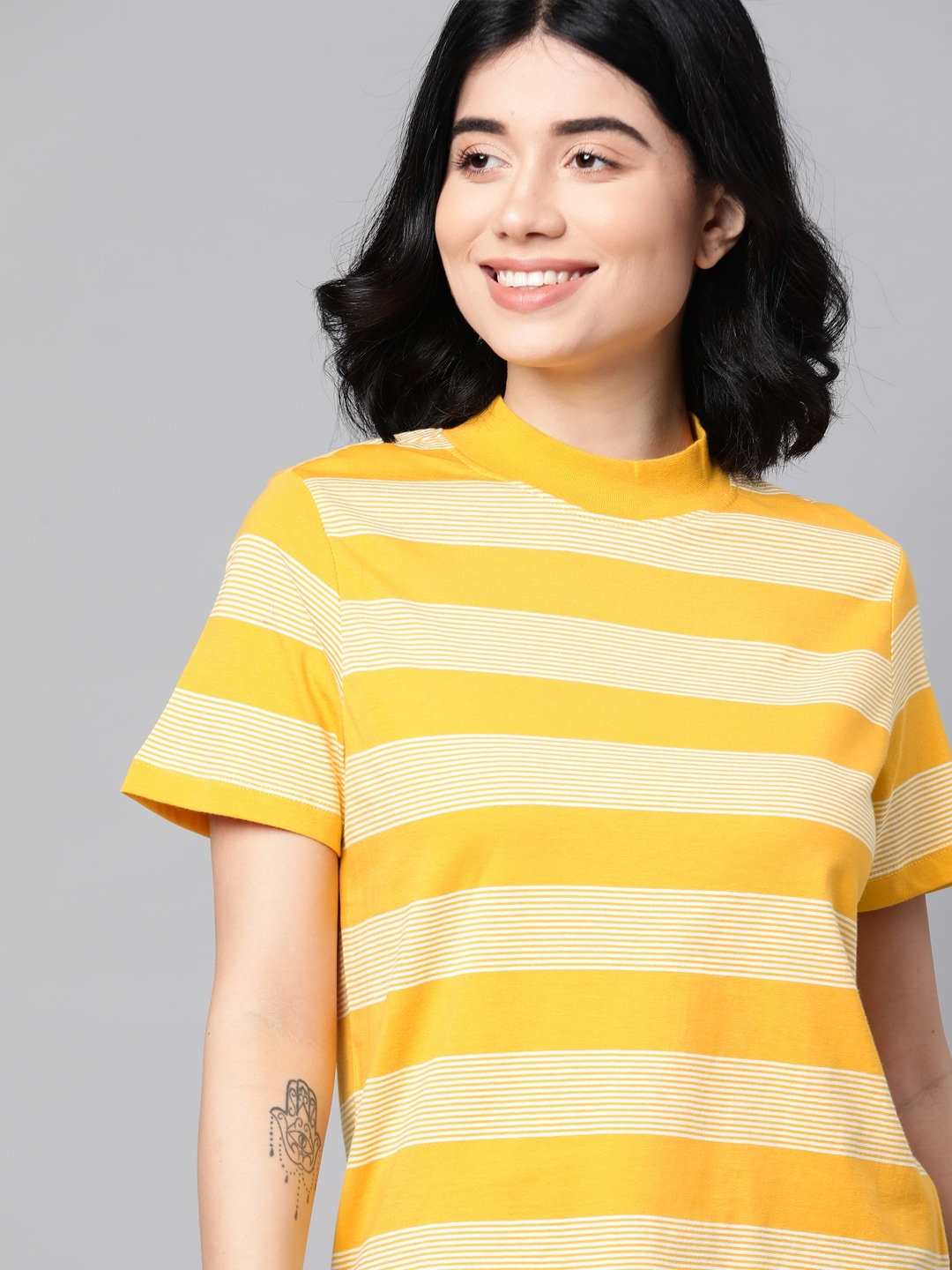 

Mast & Harbour Women Yellow & White Cotton Striped T-shirt