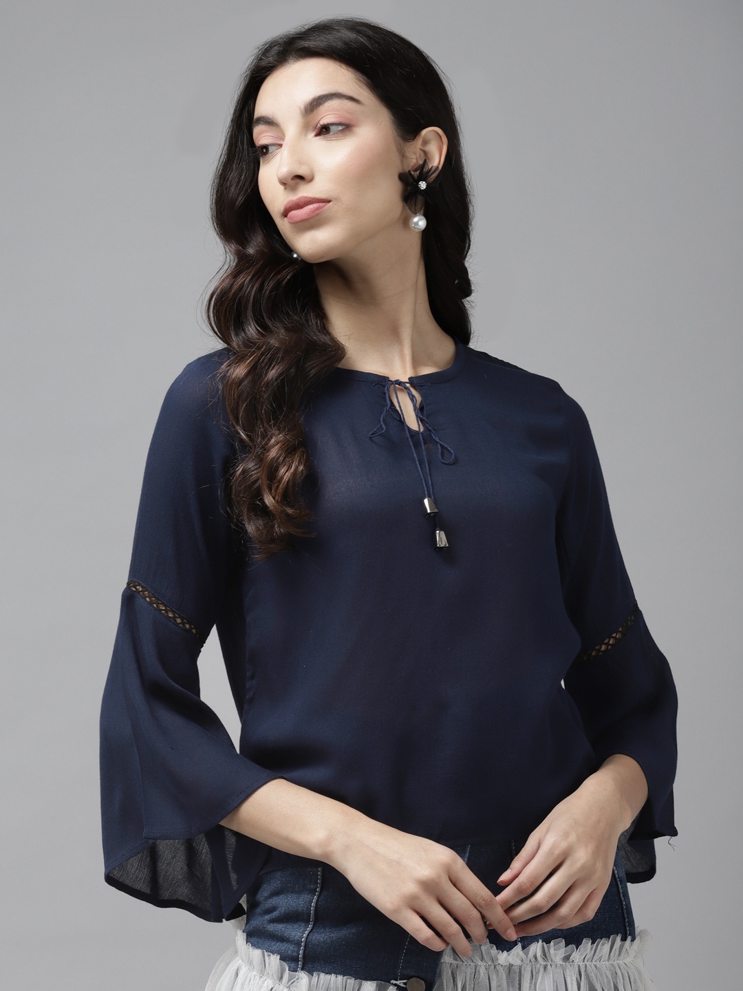 

Cayman Navy Blue Solid Tie-up Neck Bell Sleeves Regular Top