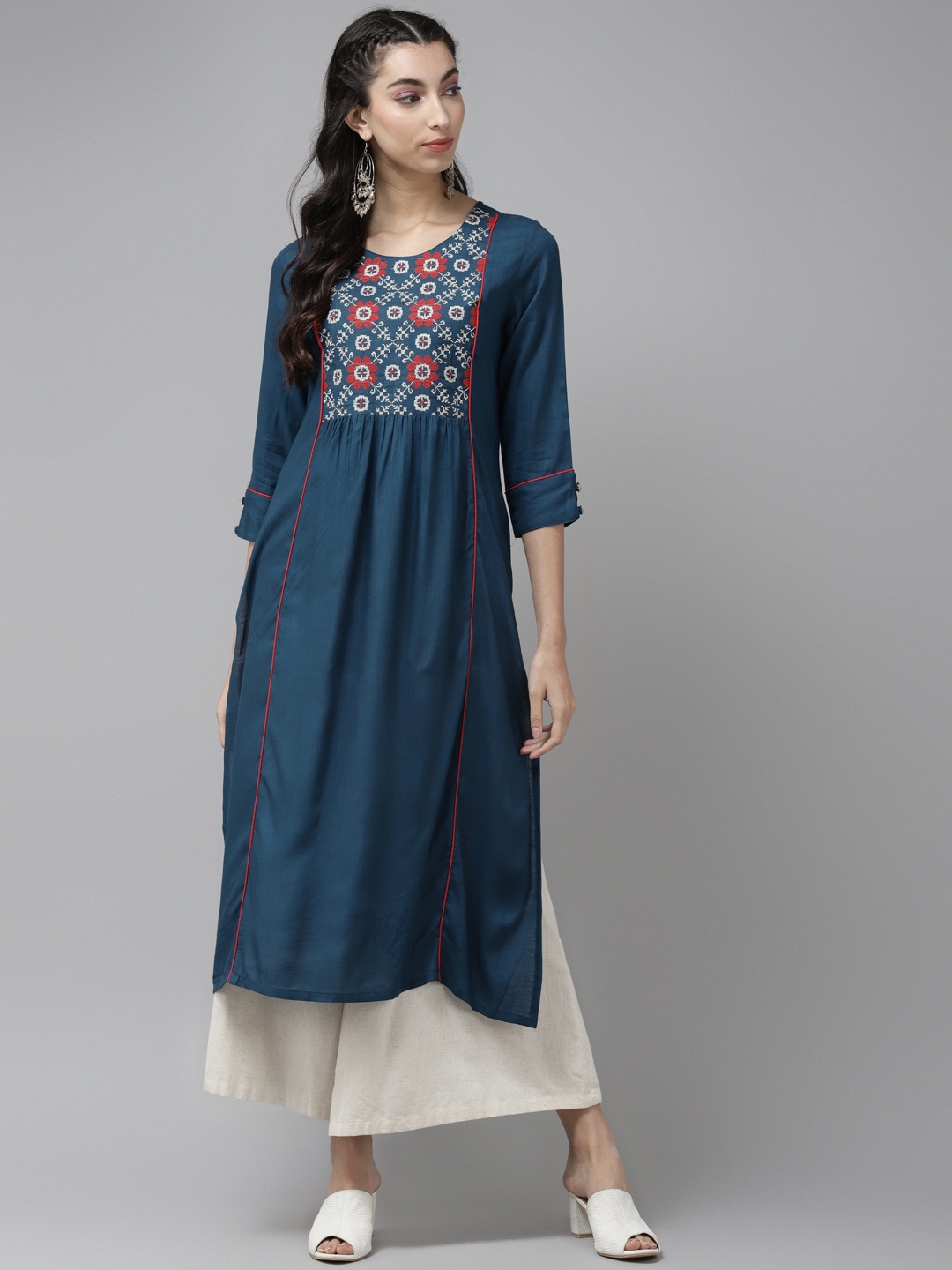 

Cayman Women Teal Blue & Red Floral Yoke Design A-Line Kurta