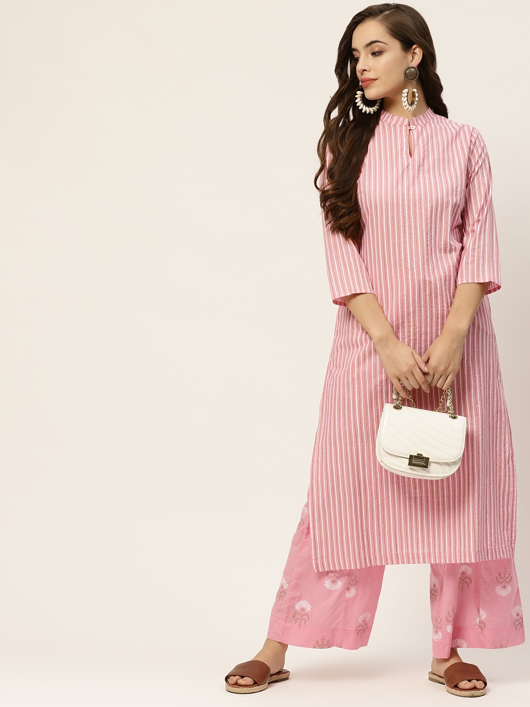 

Sangria Women Pink & White Striped Straight Kurta with Palazzos