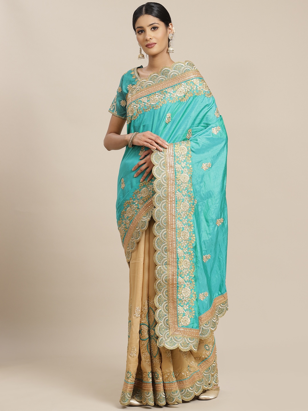 

Mitera Blue & Golden Ethnic Motifs Zari Half and Half Saree