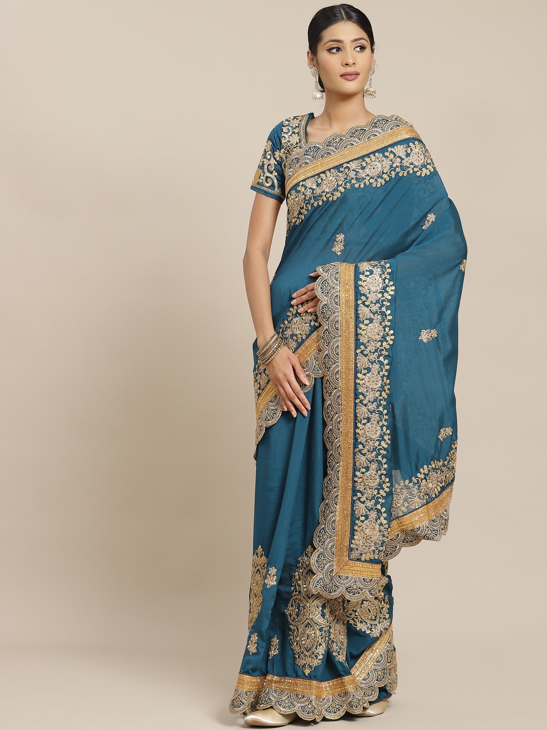 

Mitera Teal Blue & Golden Ethnic Motifs Zari Saree