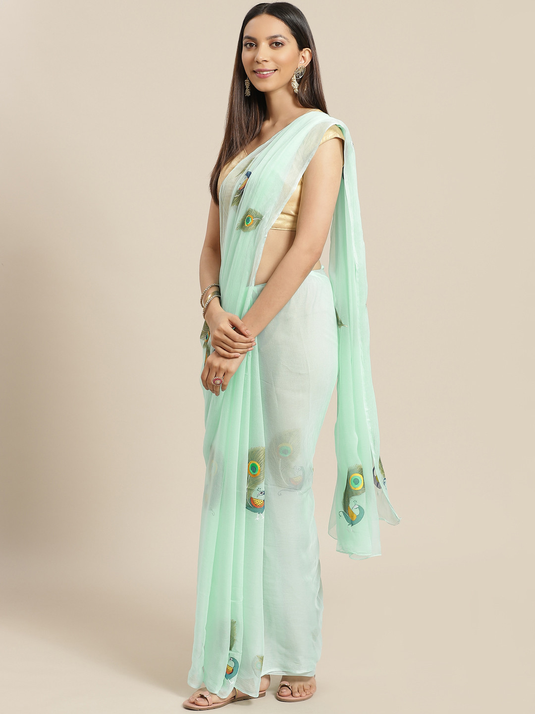 

Geroo Jaipur Sea Green Peacock Hand Painted Chiffon Sustainable Saree