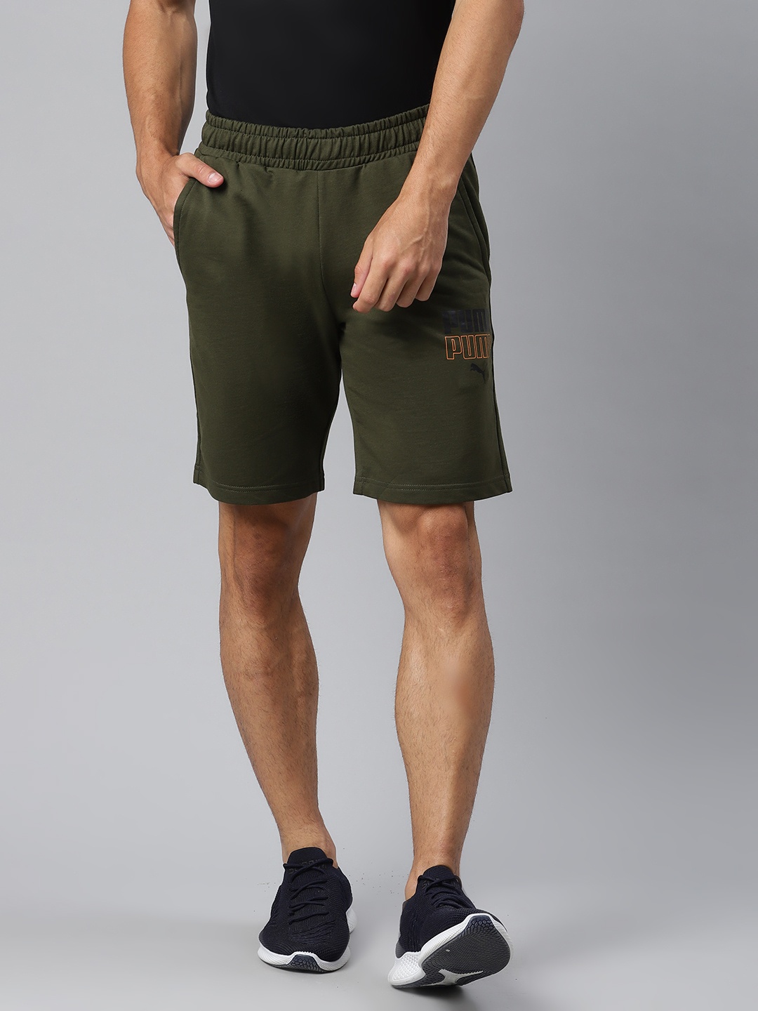 

Puma Men Olive Green Graphic 7 Solid Shorts