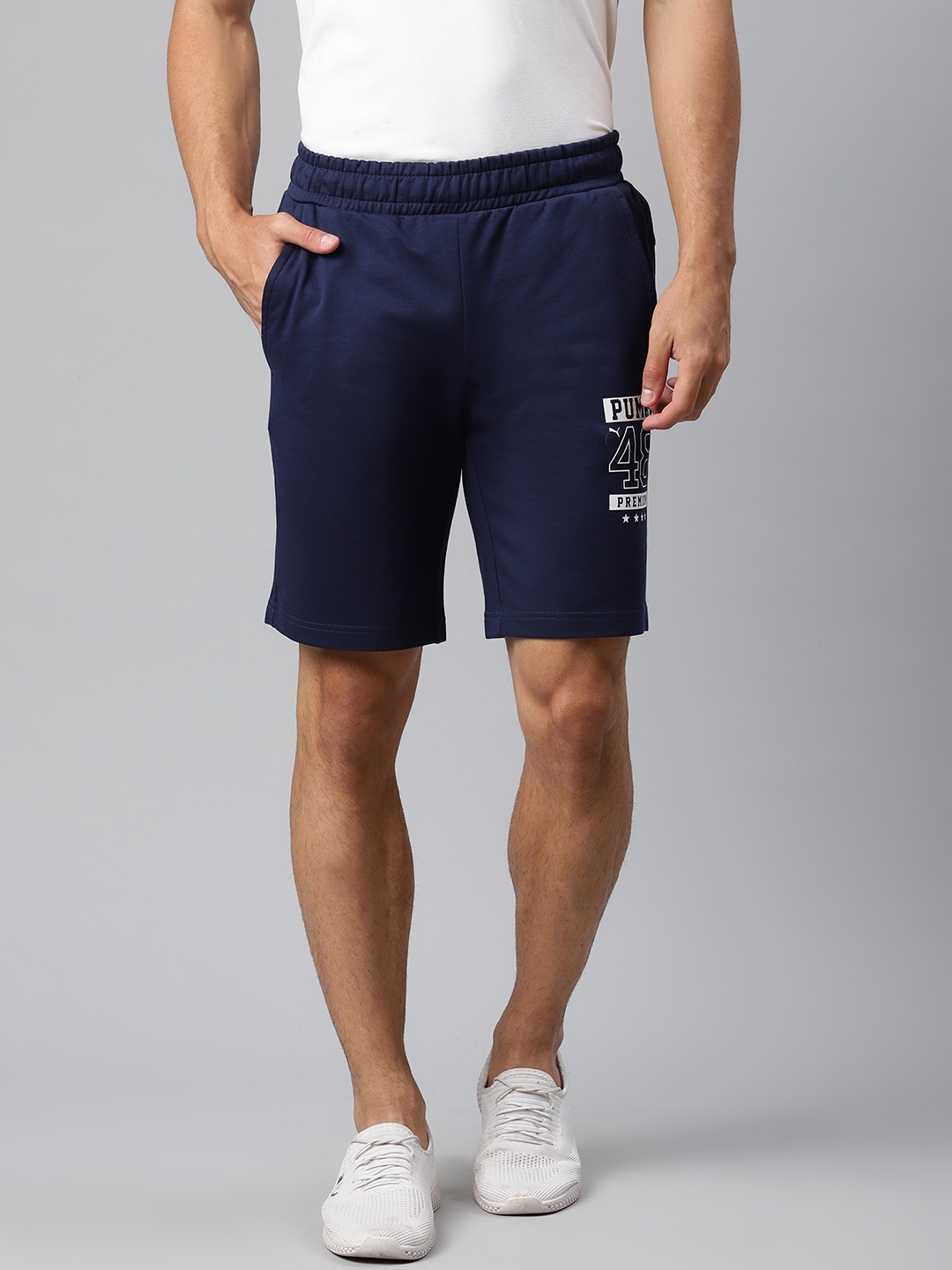

Puma Men Navy Blue Solid Graphic Sports Shorts