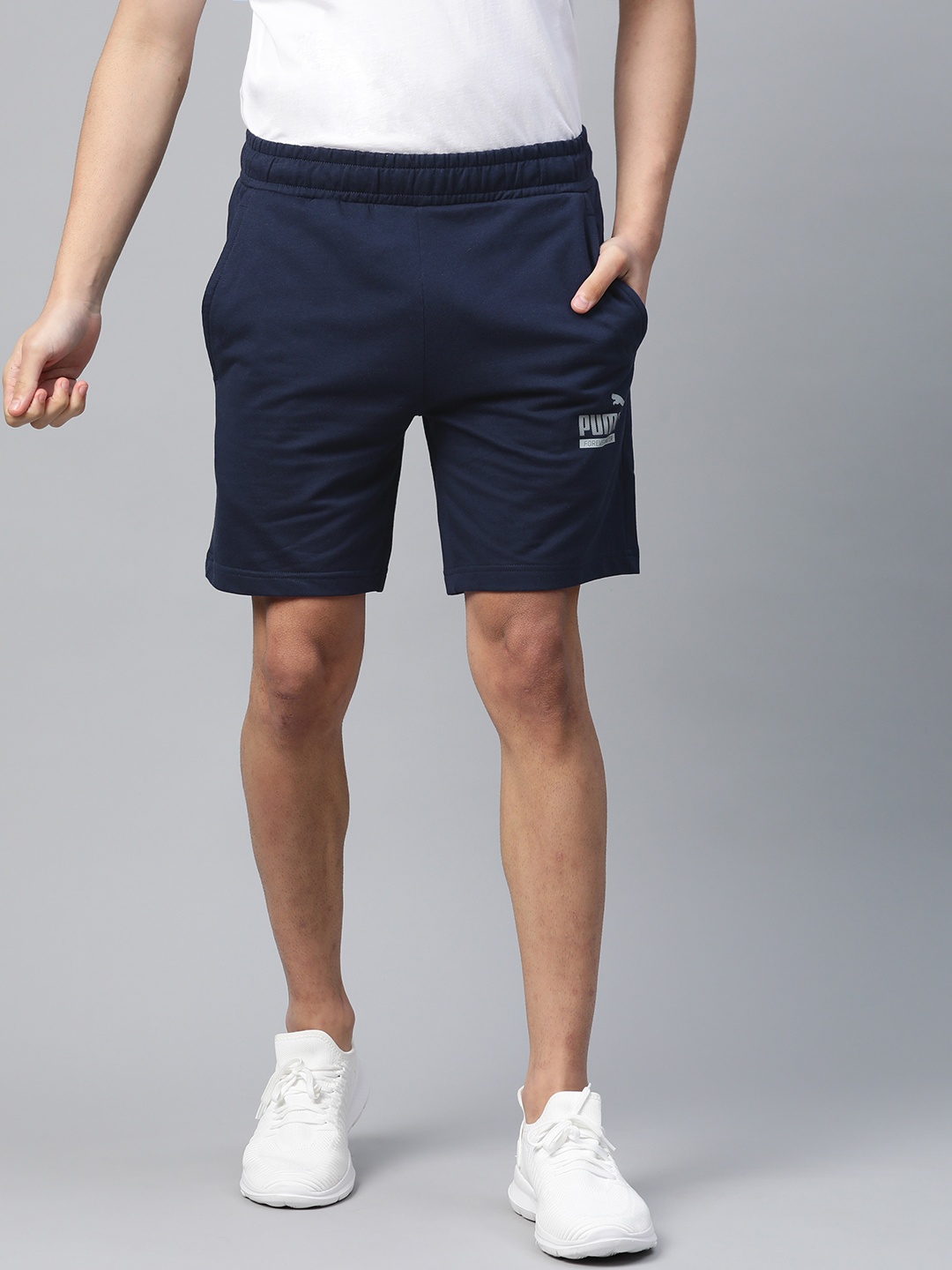 

Puma Men Navy Blue Solid Mid-Rise Graphic Bermudas TR XIII Peacoat Regular Shorts