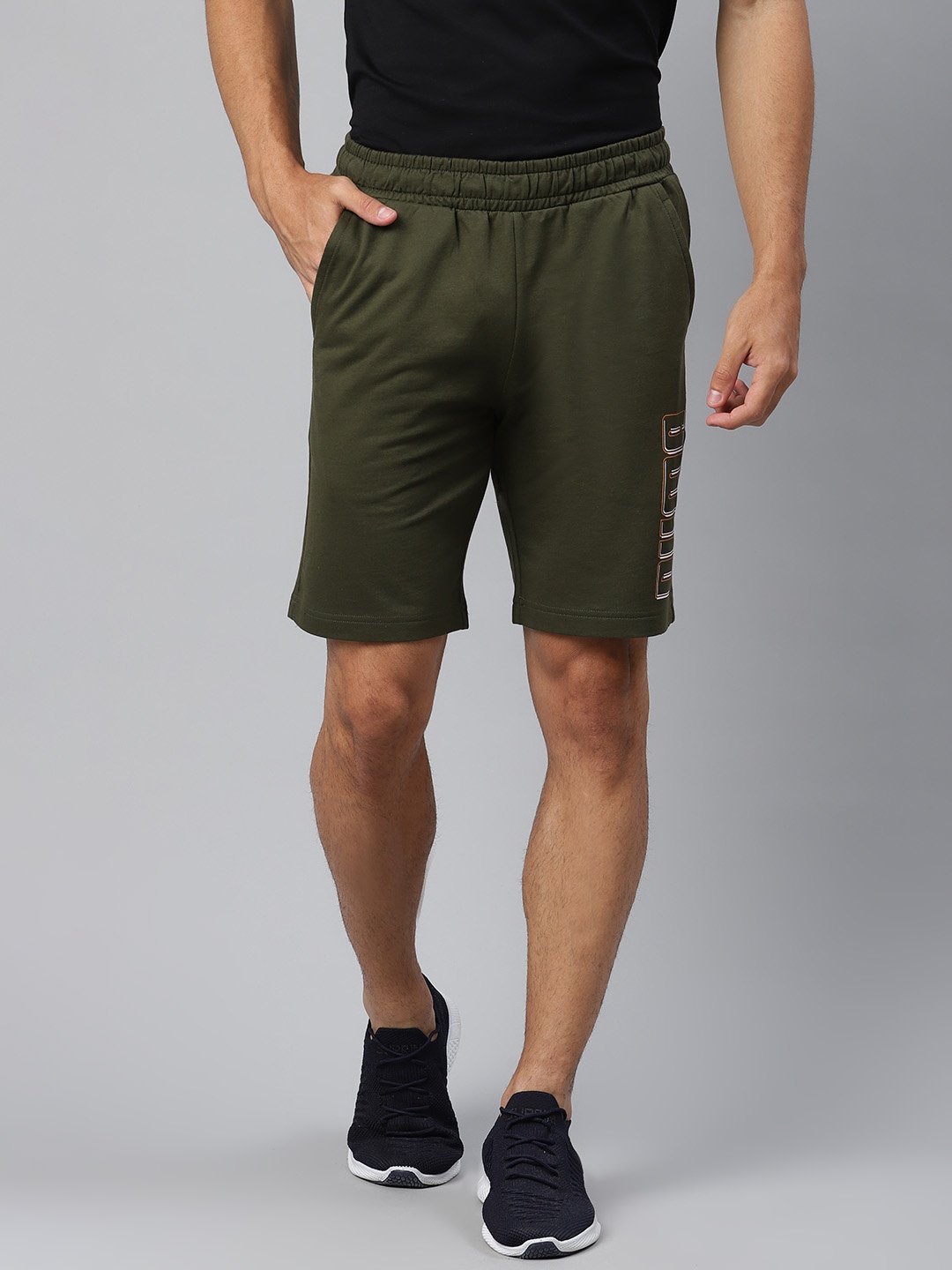 

Puma Men Olive Green Solid Graphic 17 Sports Shorts