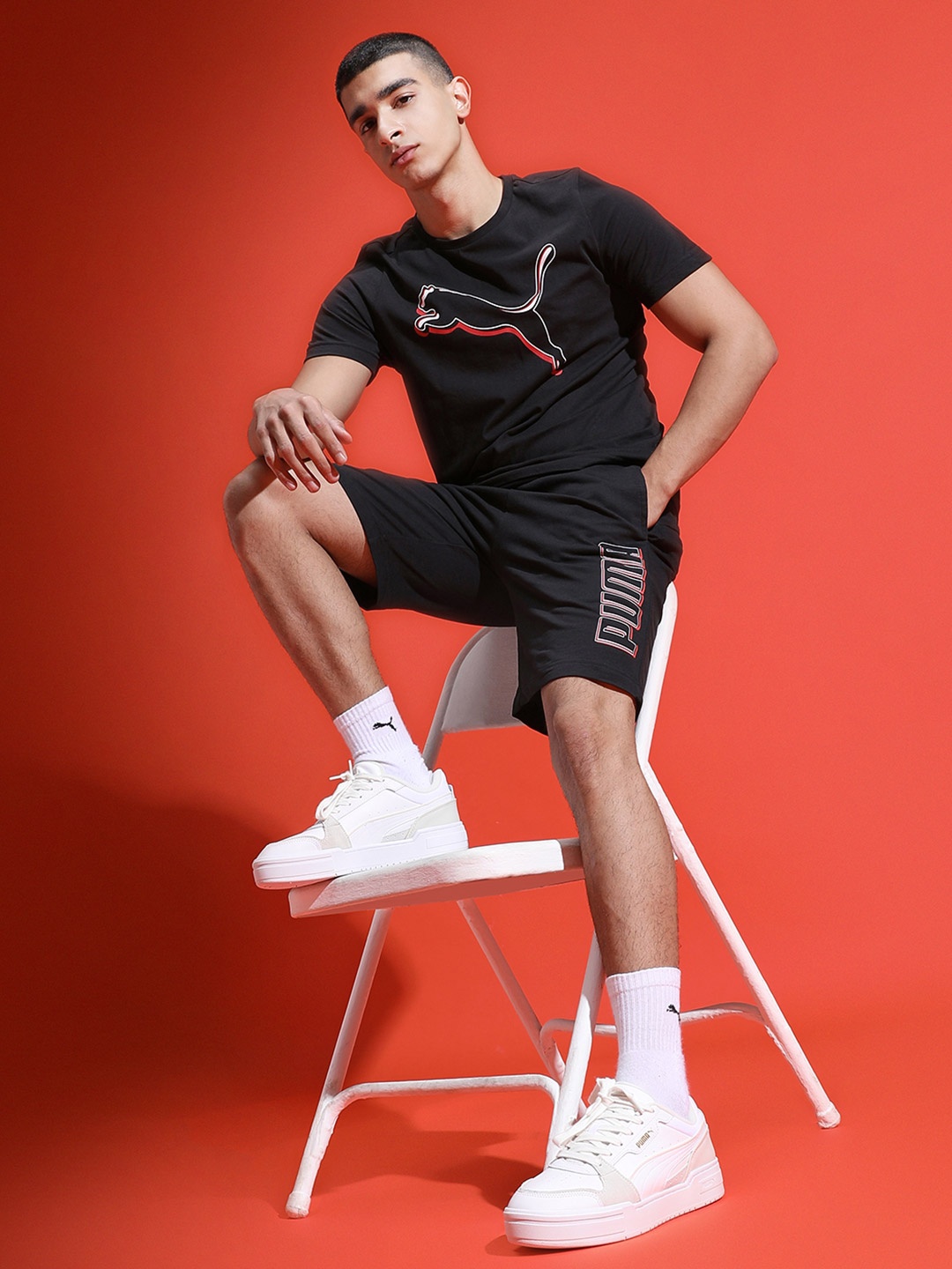 

Puma Men Black Typography Printed Mid-Rise Sports Shorts