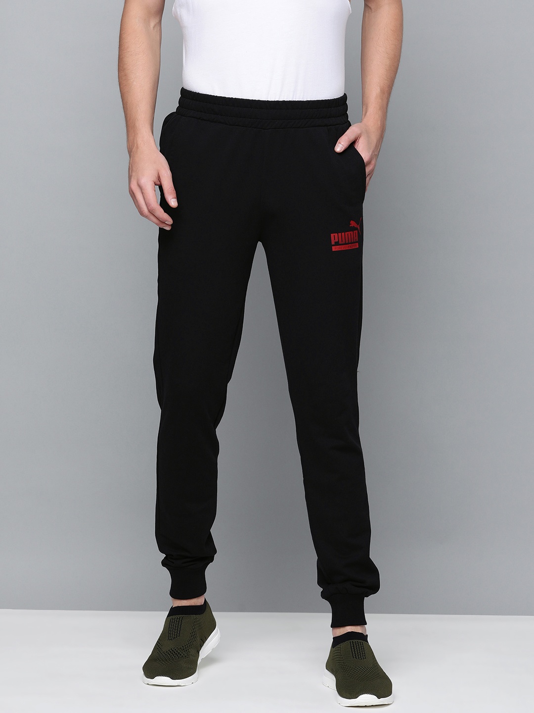

Puma Men Mns Graphic Brand Logo Printed Tr Cl XIII Slim Fit Joggers, Black