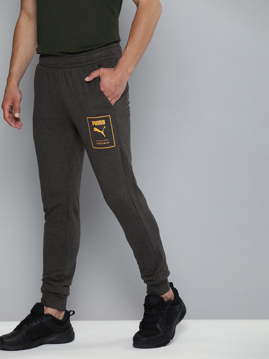 

Puma Men Grey & Orange Printed Joggers