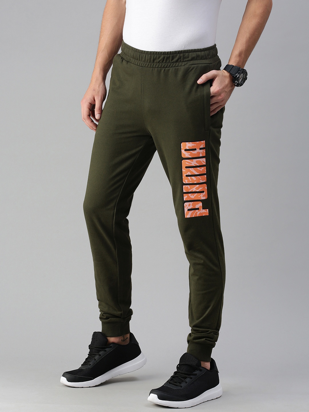 

Puma Men Olive Green Graphic 13 Forest Night Solid Slim Fit Joggers