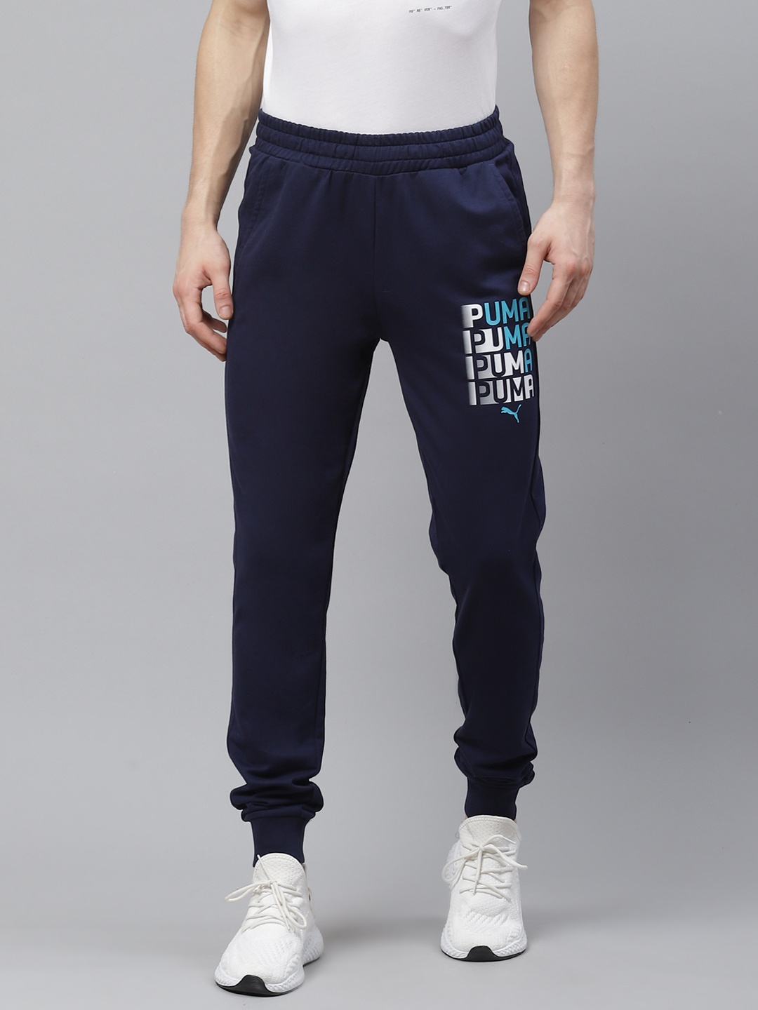 

Puma Men Navy Blue Graphic Print 12 Joggers