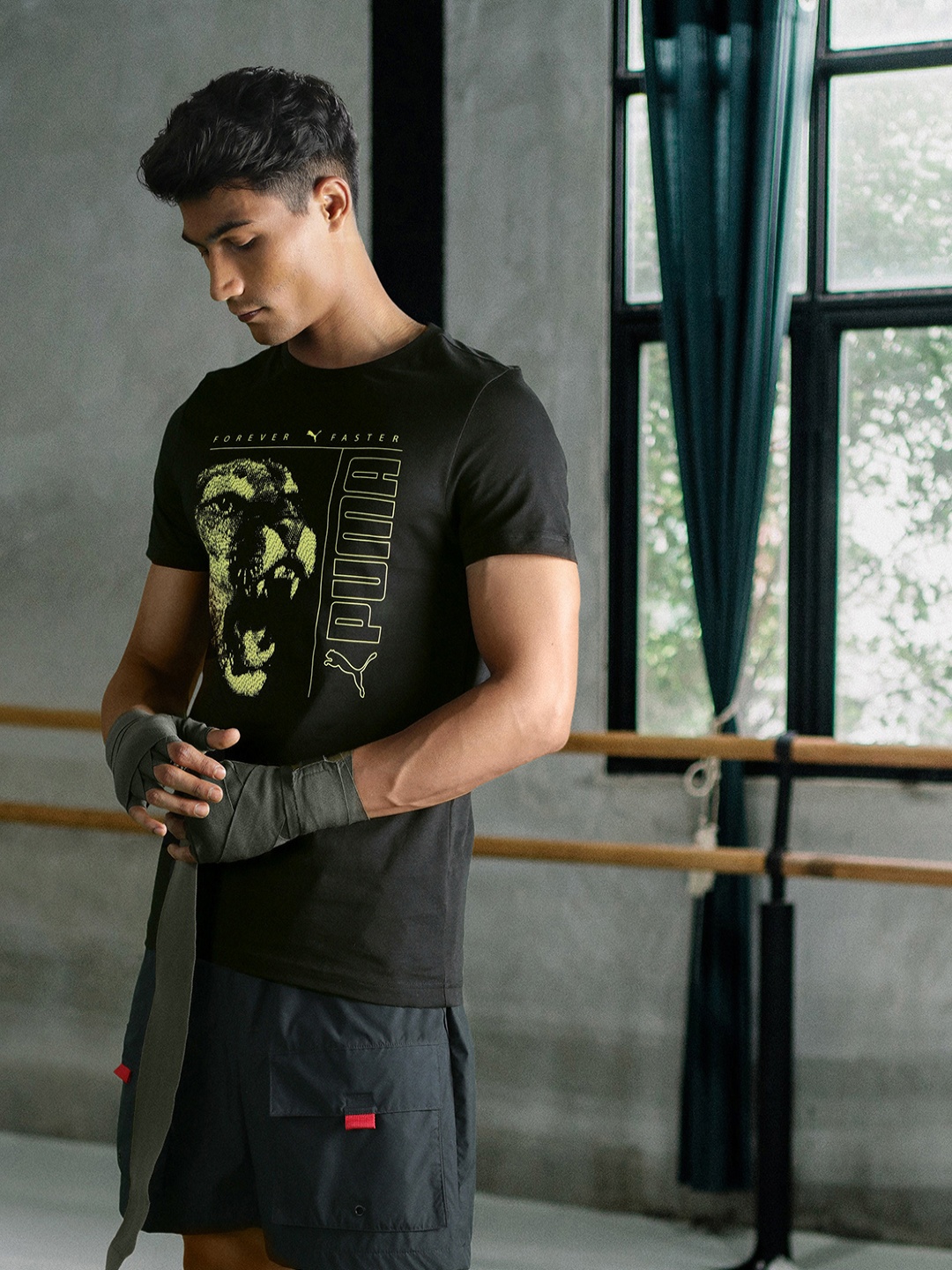 

Puma Men Black Yellow Graphic 31 Slim-Fit Pure Cotton T-shirt