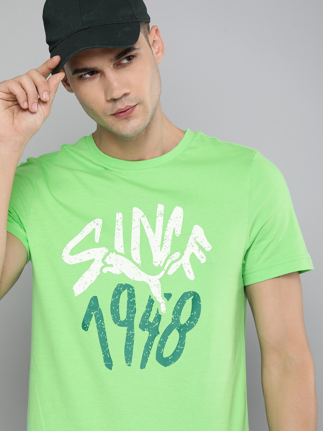 

Puma Men Green Typography Printed Slim Fit Pure Cotton T-shirt