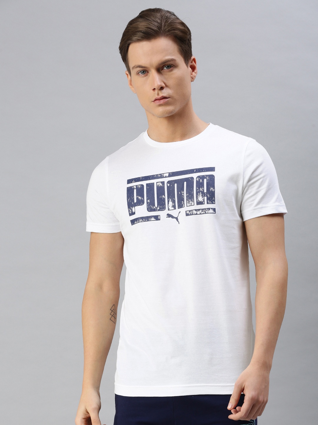 

Puma Men White Brand Logo Printed Graphic 24 Pure Cotton T-shirt