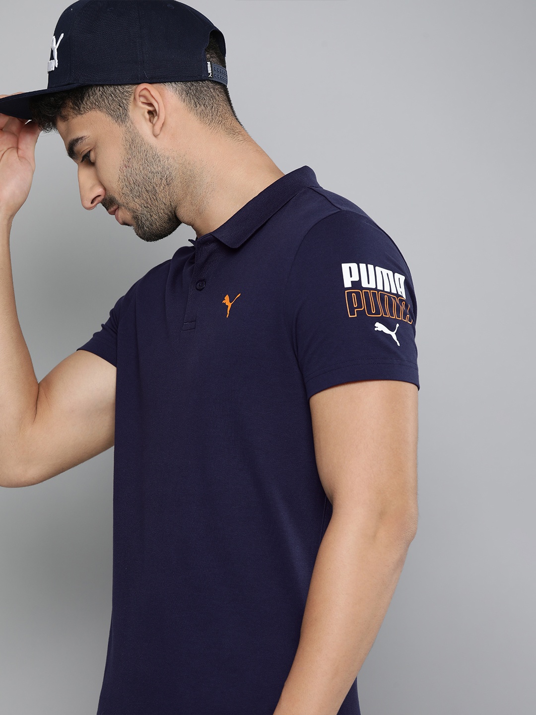 

Puma Men Navy Blue Graphic Polo Collar T-shirt