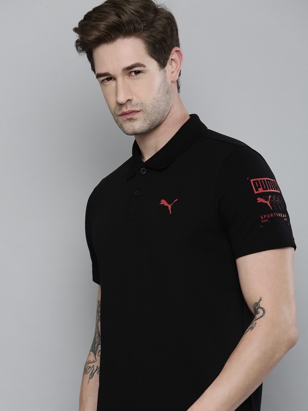 

Puma Men Black Solid Graphic Polo III Polo Collar T-shirt