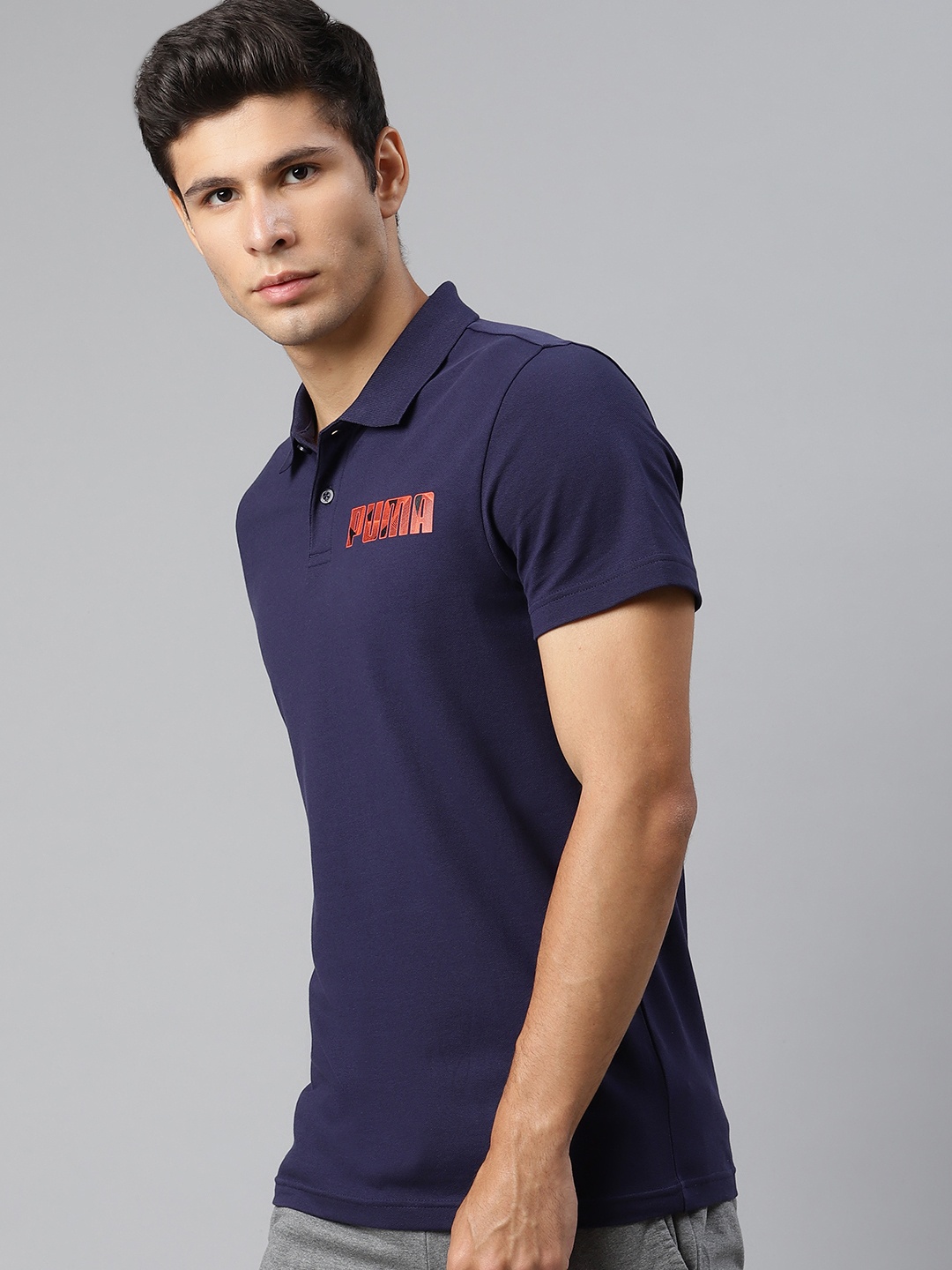 

Puma Men Navy Blue Solid Graphic Polo II T-shirt