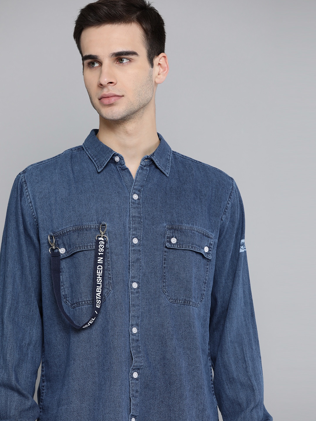 

Kook N Keech Marvel Men Navy Blue Solid Pocket Cotton Casual Shirt with Accessory