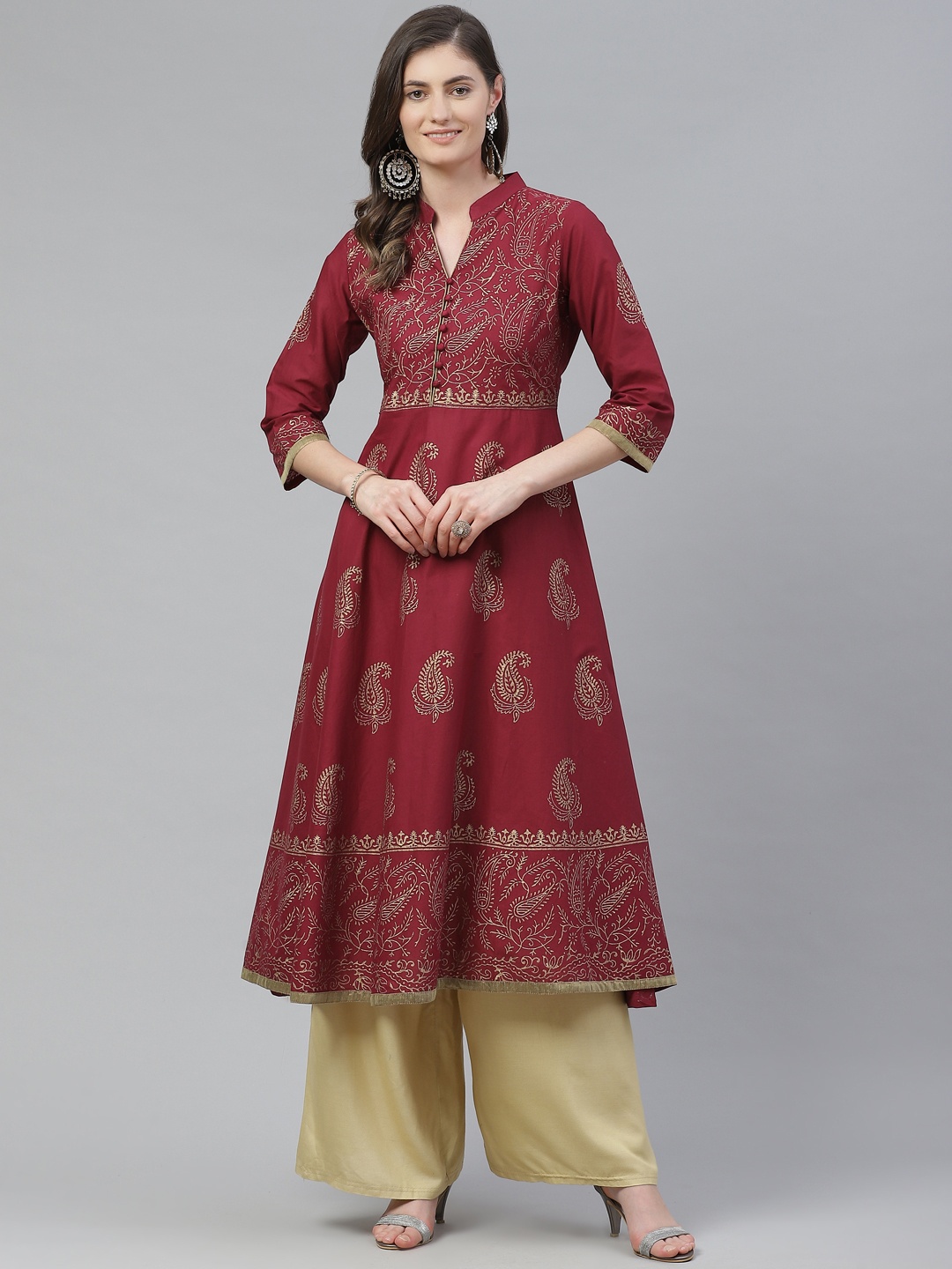 

Akshatani Women Maroon & Golden Cotton Ethnic Motifs Hand Block Print A-Line Kurta