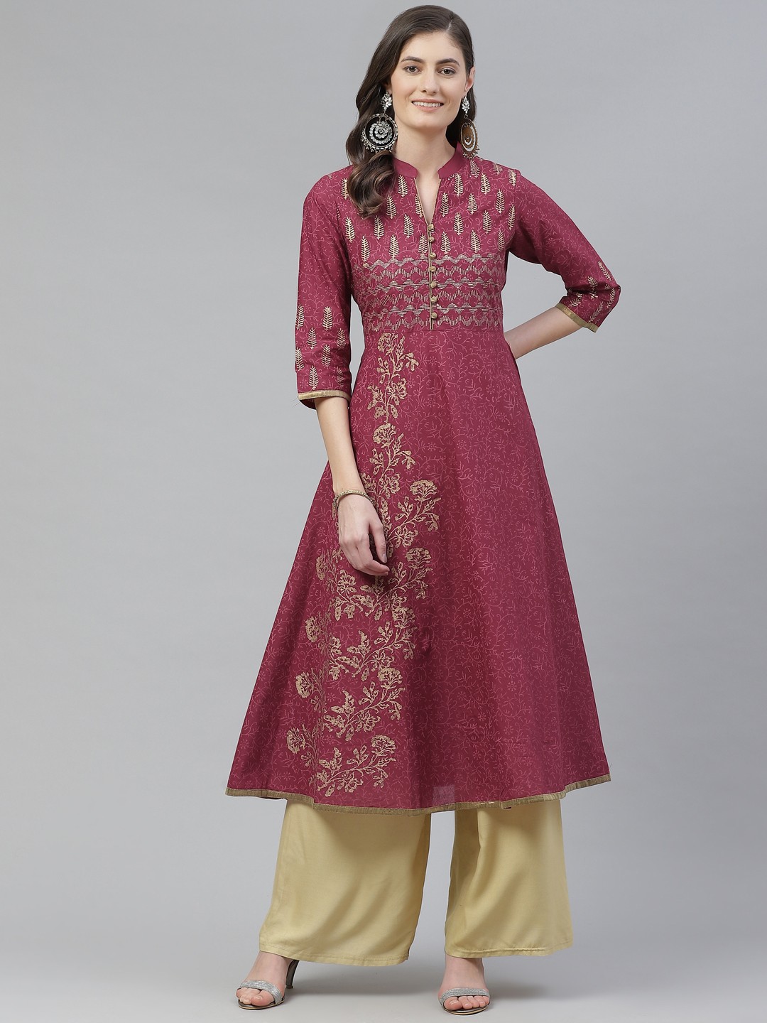 

Akshatani Women Burgundy & Golden Cotton Ethnic Motifs Hand Block Print A-Line Kurta