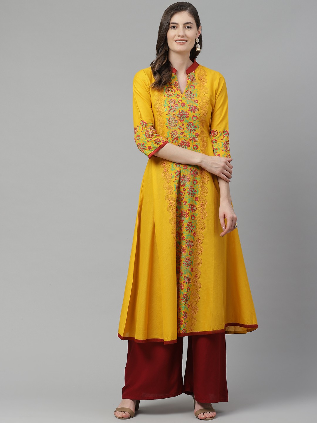 

Akshatani Women Mustard Yellow & Maroon Cotton Ethnic Motifs Hand Block Print A-Line Kurta