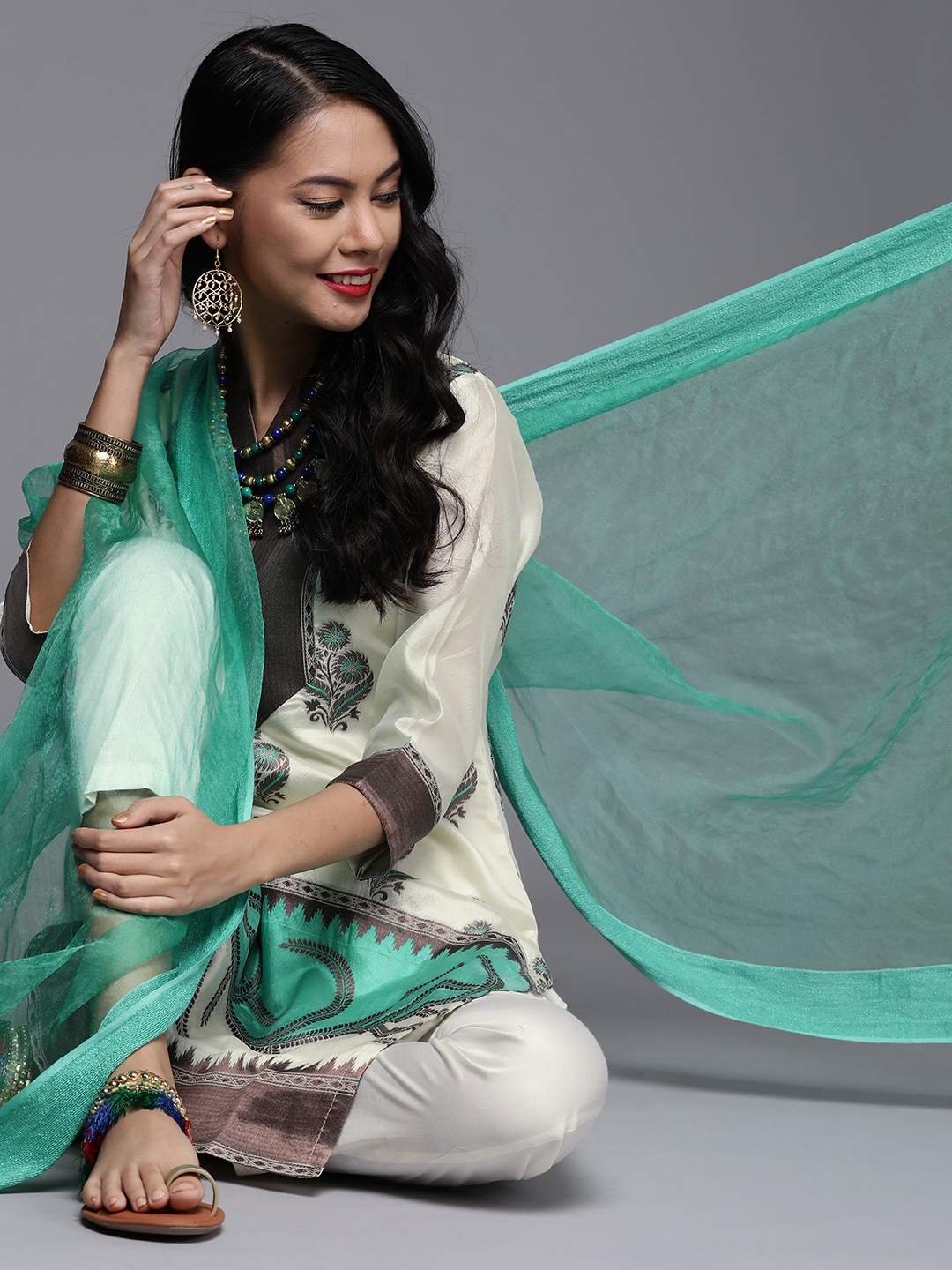 

Inddus Off-White & Green Woven Design Unstitched Dress Material