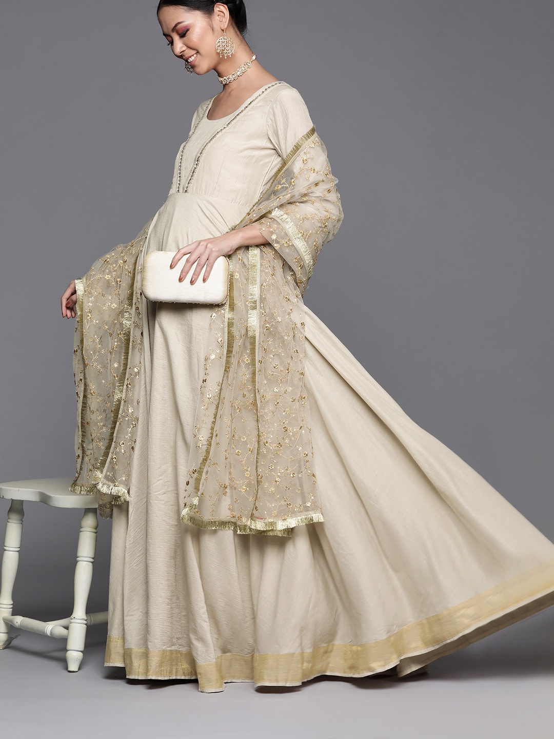 

Inddus Women Off White & Golden Solid Mirror Work Anarkali Kurta with Dupatta