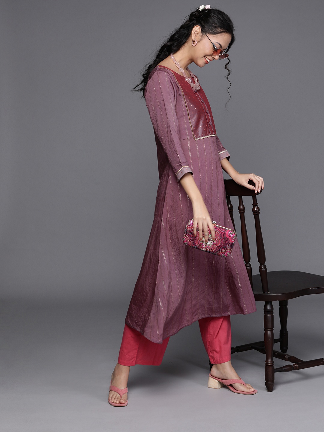 

Inddus Women Mauve & Golden Striped A-line Kurta
