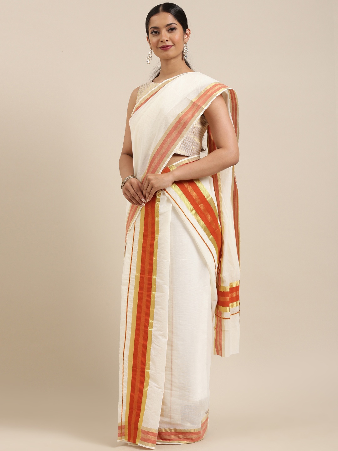 

Mitera Off-White & Rust Orange Pure Cotton Solid Handloom Kasavu Mundu Saree