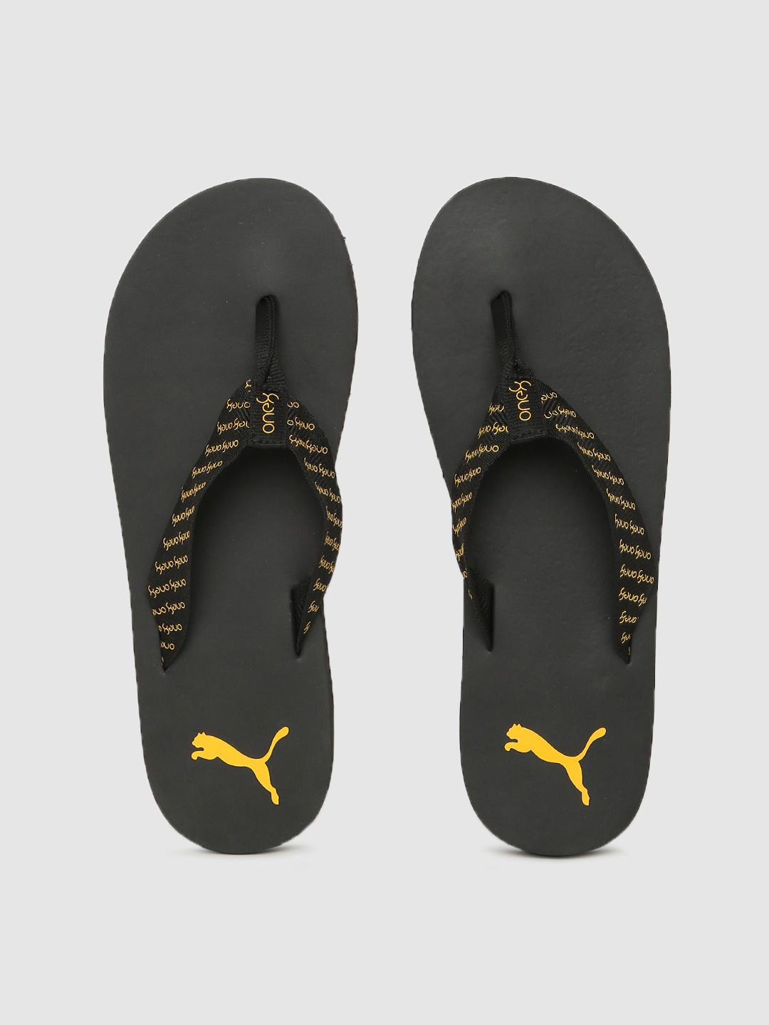

one8 x PUMA Men Black & Yellow Printed Thong Flip-Flops