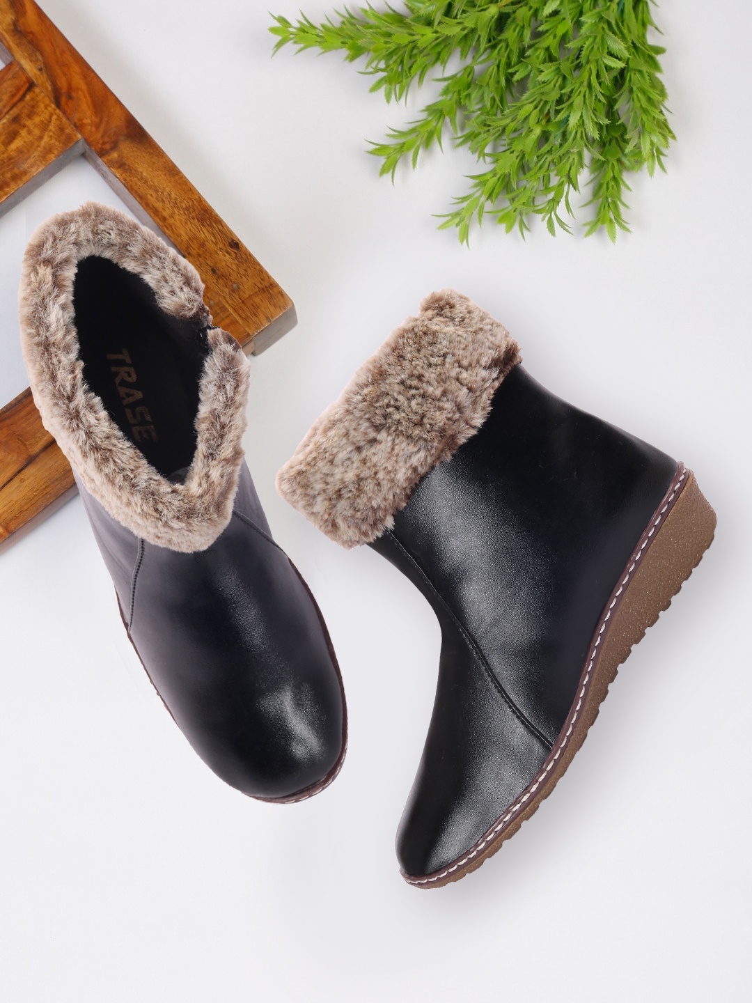 

TRASE Women Black Solid Heeled Boots