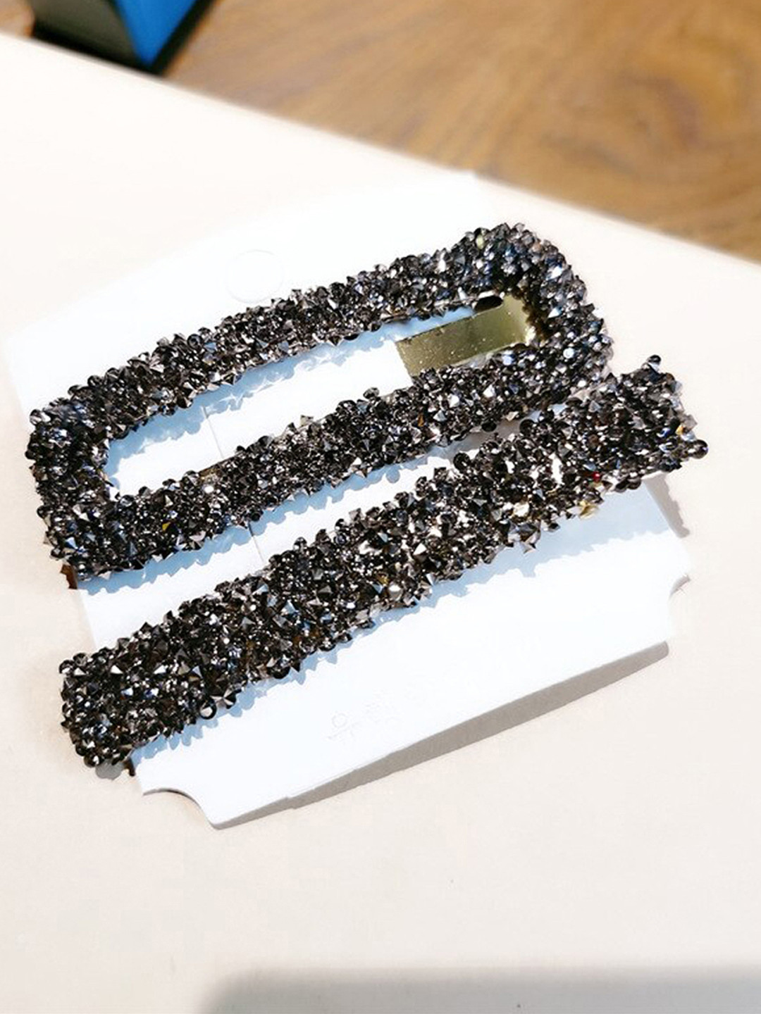 

Jewels Galaxy Women Set of 2 Black & Gold-Toned Embellished Hair Clips
